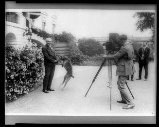 Harding with pet dog.